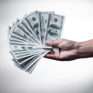 Best High-Income Skills to Learn in 2026 That Will Future-Proof Your Career person holding 100 US Dollar banknote